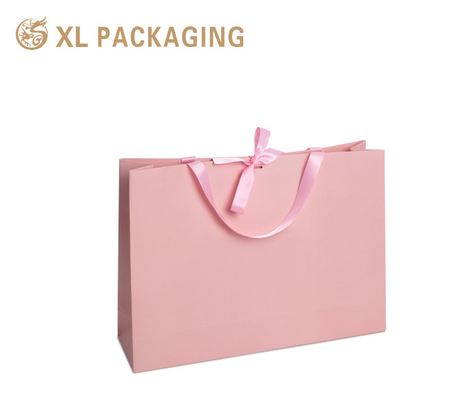 Купить Розовый розовый бутик Покупки Подарочный бумажный пакет 250G Gsm Картонные пакеты с собственным логотипом online manufacture